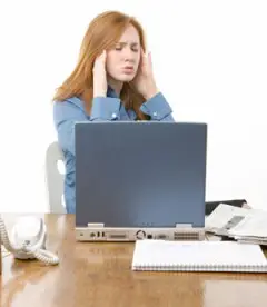 Girl is having tough time, as there is lot of work to be done beforfe her interview. She is experiencing headache while preparing for the interview questions. 